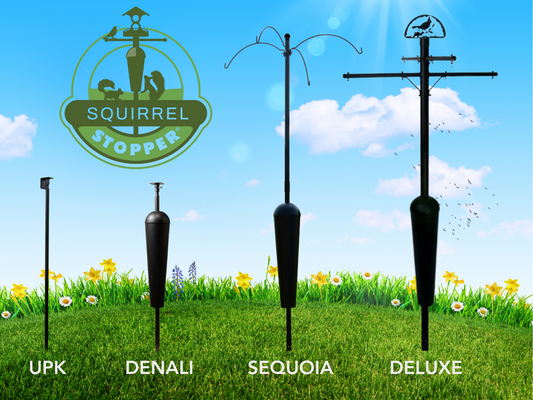 Four Squirrel Stopper feeder poles displayed against a sunny sky and flower field, labeled UPK, DENALI, SEQUOIA, DELUXE.