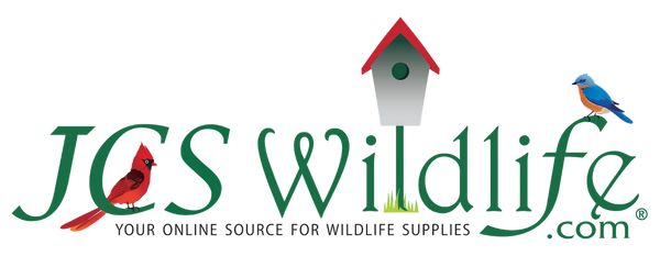 JCS Wildlife logo featuring a red cardinal, bluebird, and birdhouse, representing nature and wildlife.