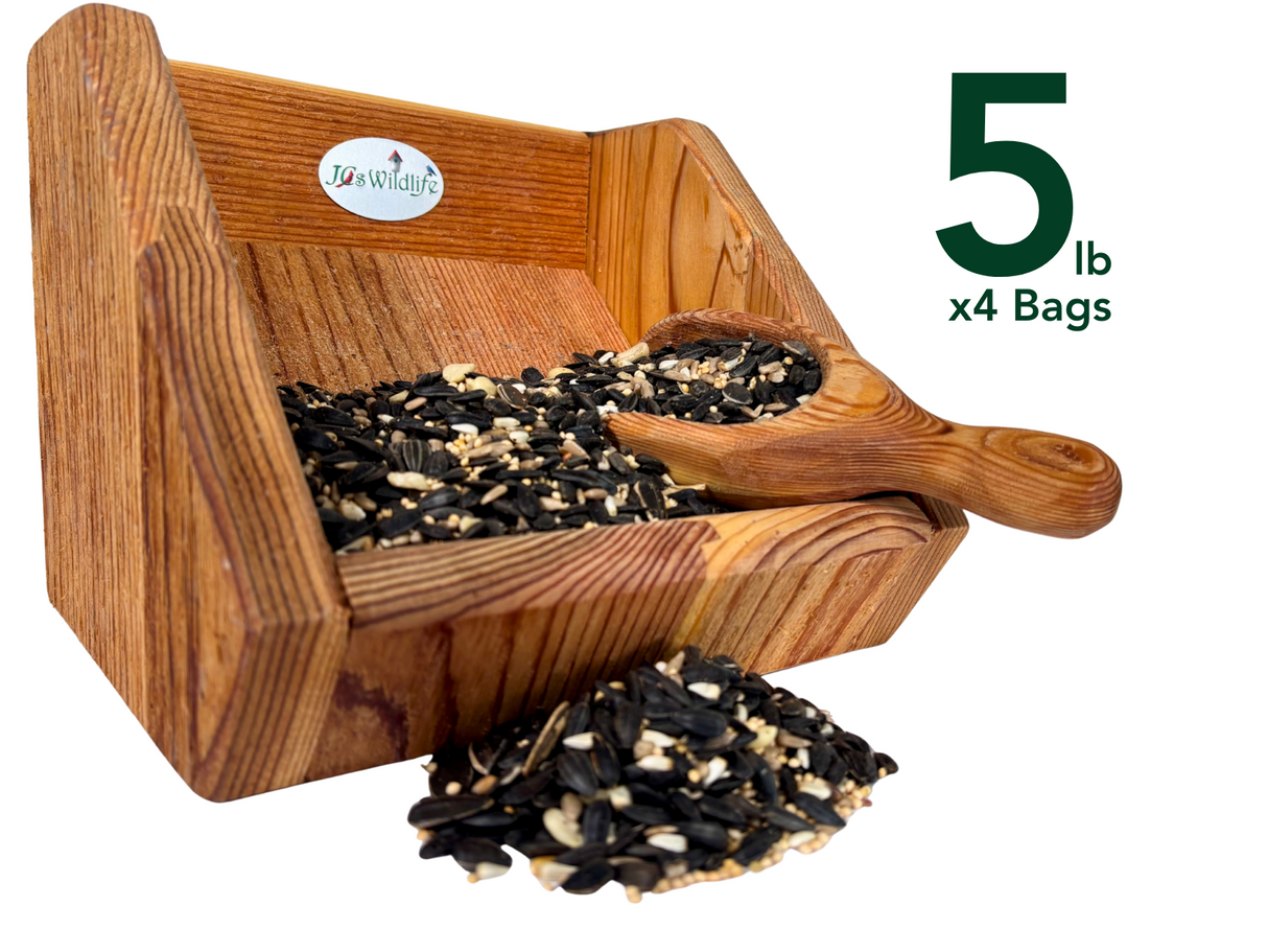 JQs Wildlife wooden bird feeder filled with sunflower seeds millet and cracked corn showcasing a rustic wooden scoop and rich wood grain.
