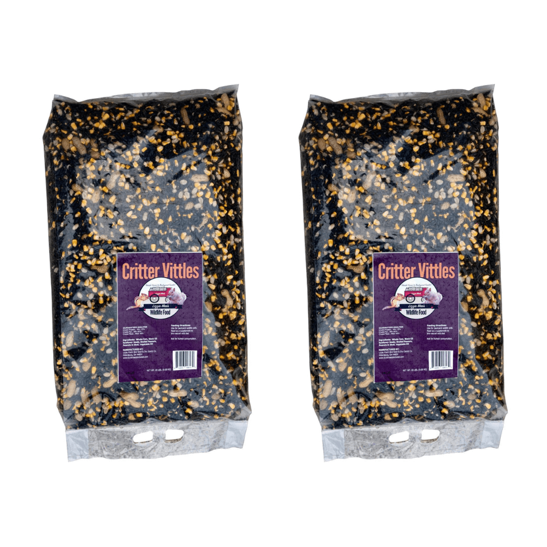 Two bags of JCS Wildlife Critter Vittles 20lbs Loose Seed with label visible, filled with black oil sunflower seeds, corn, and peanuts.