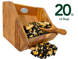 Photograph of a JQs Wildlife wooden bird feeder overflowing with black oil sunflower seeds peanuts and corn kernels in a studio setting