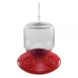 Plastic hummingbird feeder with a clear reservoir a red base and three flower-shaped feeding ports featuring a metal hanging hook