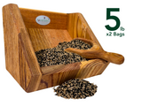 JGs Wildlife wooden bird feeder filled with black oil sunflower seeds and a small wooden scoop showing a mix of beige and black seeds with visible wood grain
