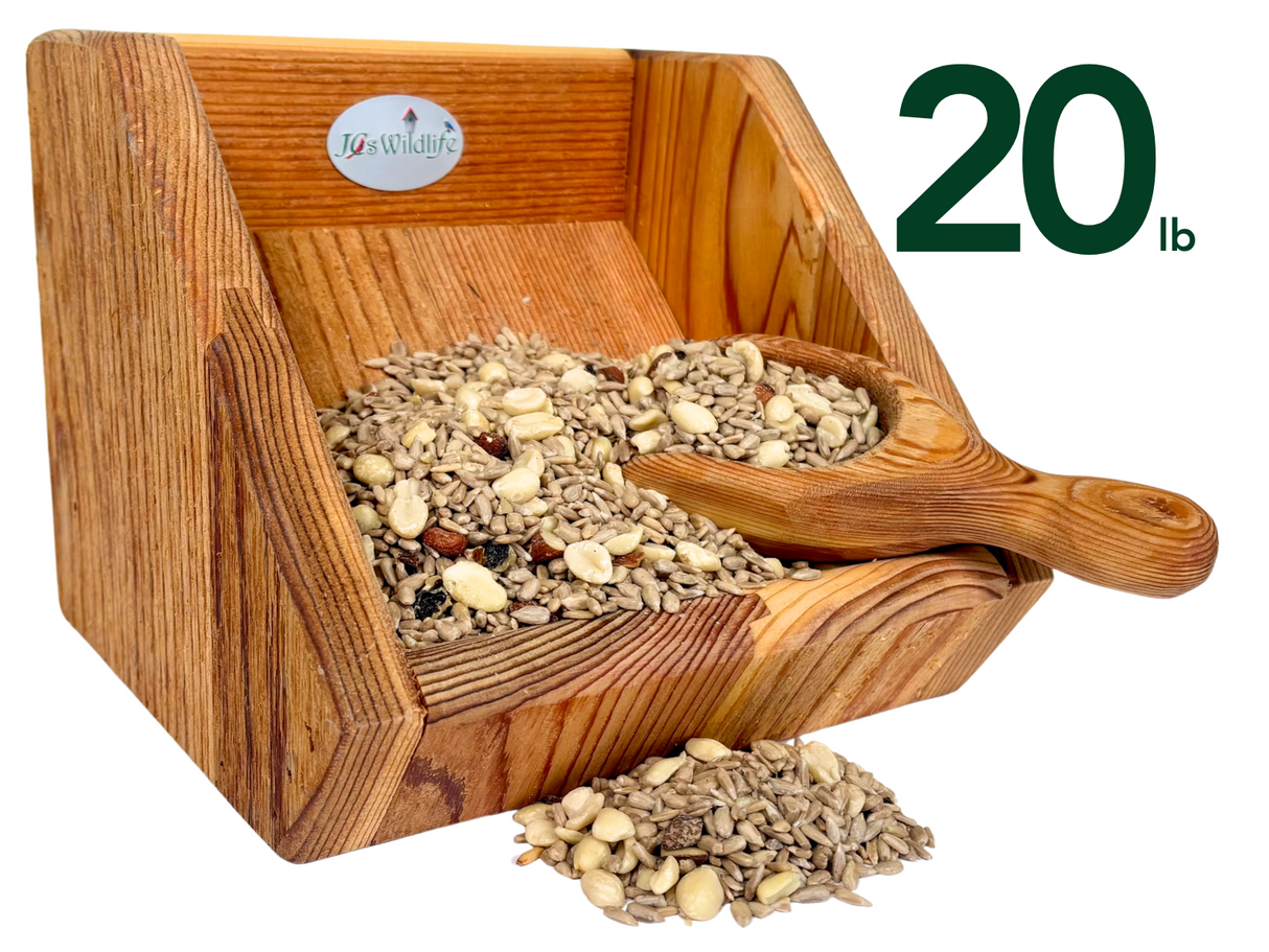 JCs Wildlife wooden bird feeder filled with 20 lbs of sunflower seeds peanuts and dried berries showcasing rich wood grain and a small wooden scoop
