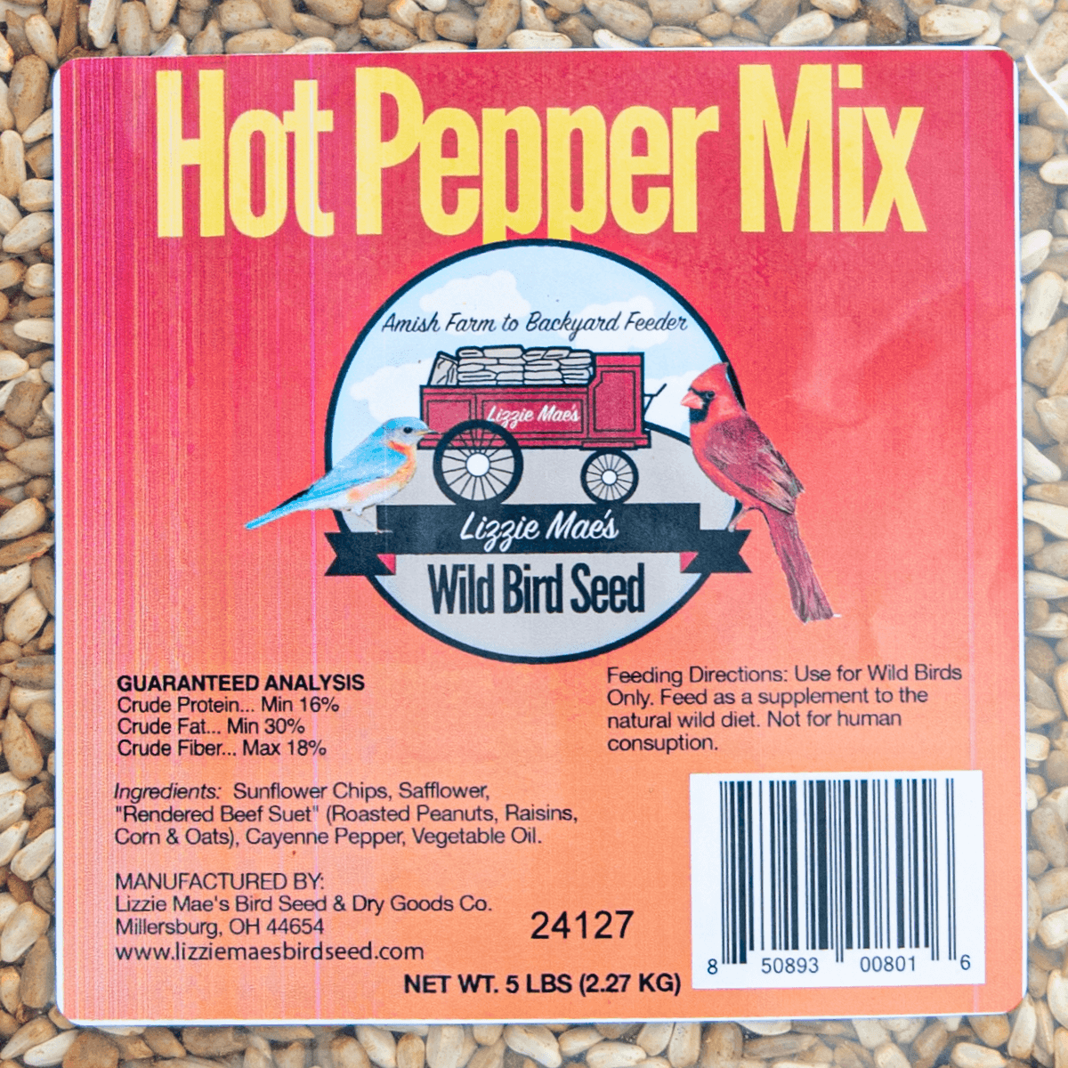 JCS Wildlife Hot Pepper Mix bird seed label for wild birds, not mammals, 5lb bag with chili peppers and sunflower chips.