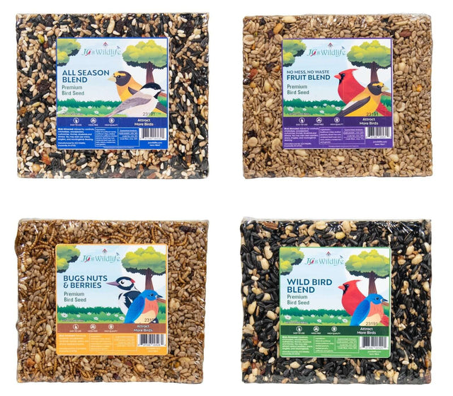 JCs Wildlife 4 Pack Premium Bird Seed Blend Large Cake Variety Pack featuring All Season Blend, Fruit Blend, Bugs Nuts & Berries, and Wild Bird Blend.