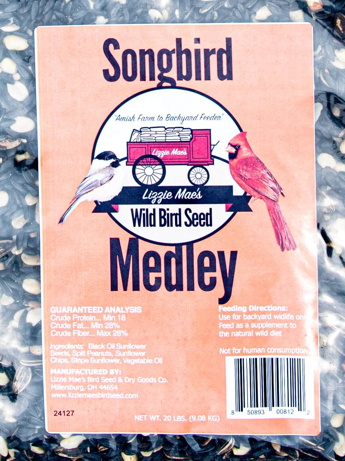 JCS Wildlife Songbird Medley 20lb bag of premium wild bird seed with black oil sunflower seeds, split peanuts, and sunflower chips.