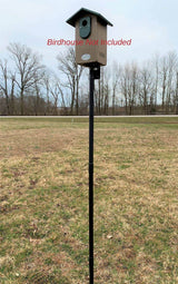 Universal mounting pole kit with birdhouse not included, displayed in an open field