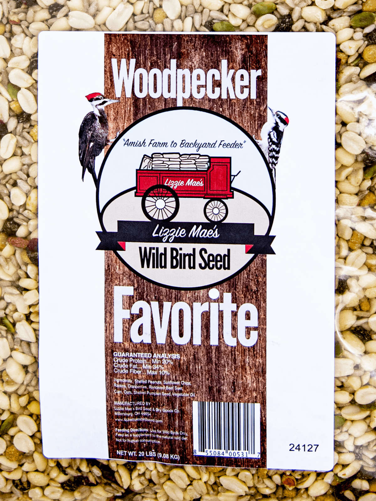 JCS Wildlife Woodpecker Favorite 20lb Loose Seed Bag with suet, nuts, and dried fruit, ideal for attracting woodpeckers and other clingers.