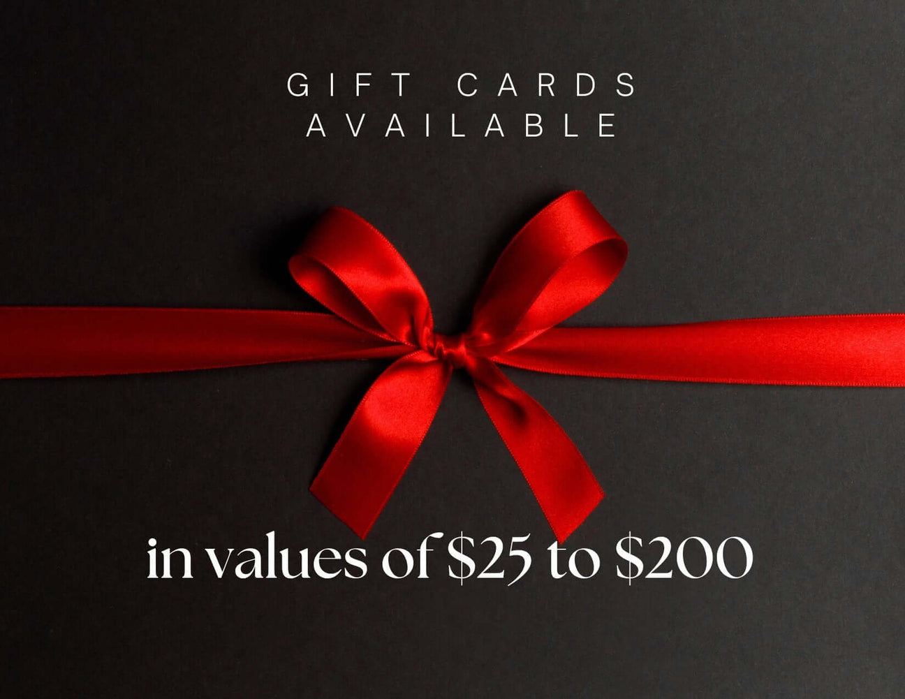 JCS Wildlife Gift Card available, featuring red ribbon, in values from $25 to $200 for birding lovers.
