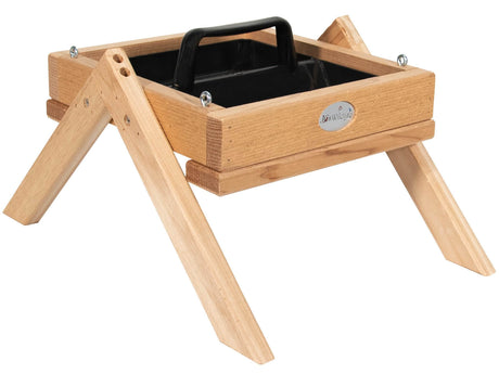 JCS Wildlife Cedar Platform Ground Feeder Medium with removable black tray and built-in handle for easy filling and cleaning in garden.